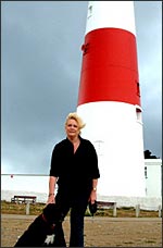 photo of Maxine by the lighthouse on holiday