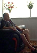 photo of Bernard in an armchair